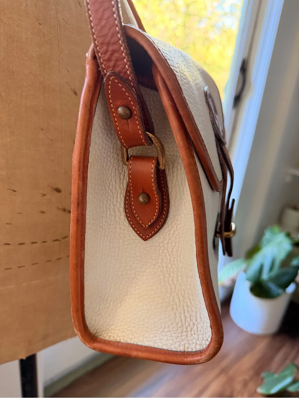 Dooney & Bourke cream pebbled
